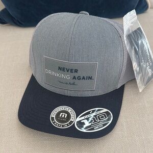 Travis Mathew Gray and Navy Hat